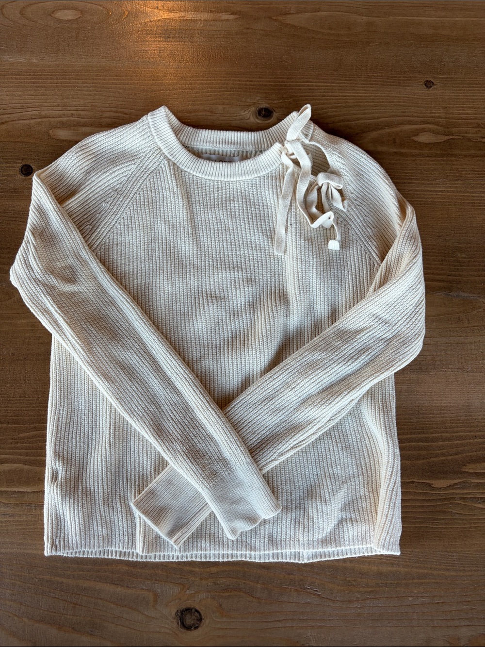 LOFT Women’s Cream Ribbed Tie-Shoulder Sweater. Soft and comfortable feel.